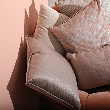 The combination of Eclectic, Geometric and Modern pillows, with the refined elegance of ESSEX Armchair and the routes of YUPIK Rug makes the ultimate irreverent home decor.